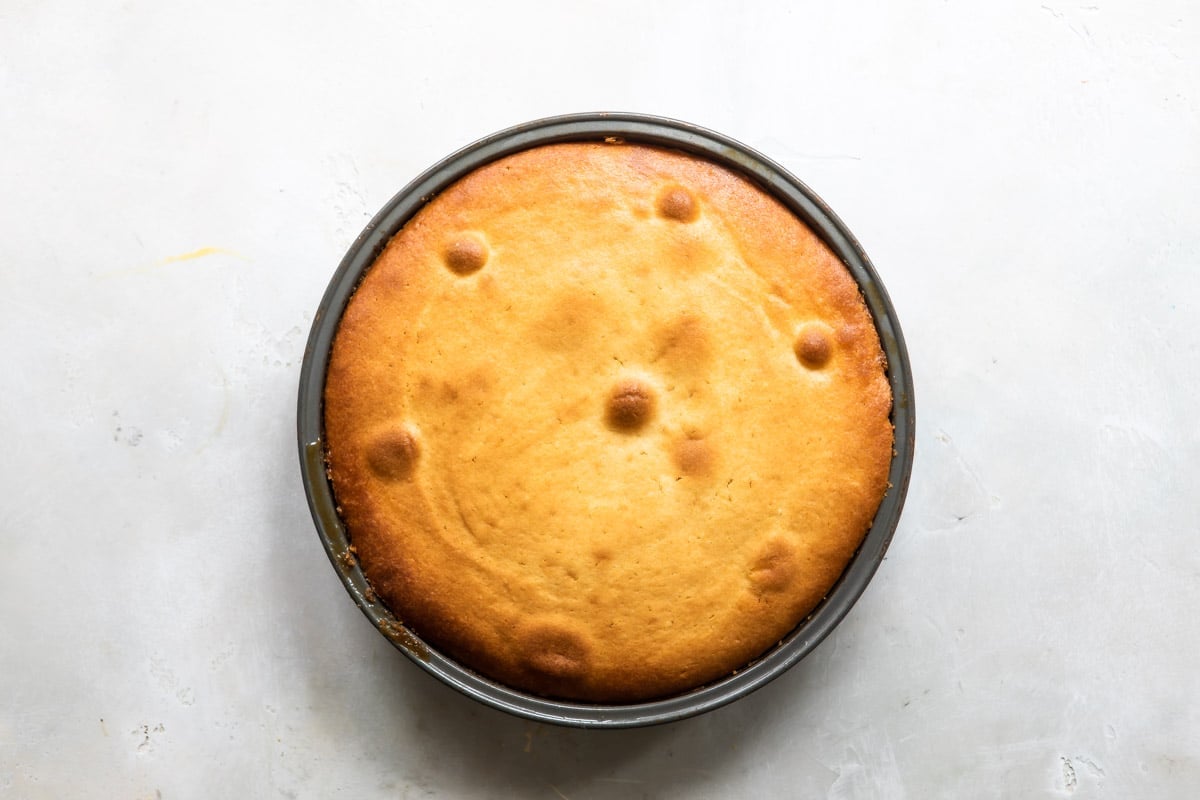 A pineapple upside down cake before being flipped over.