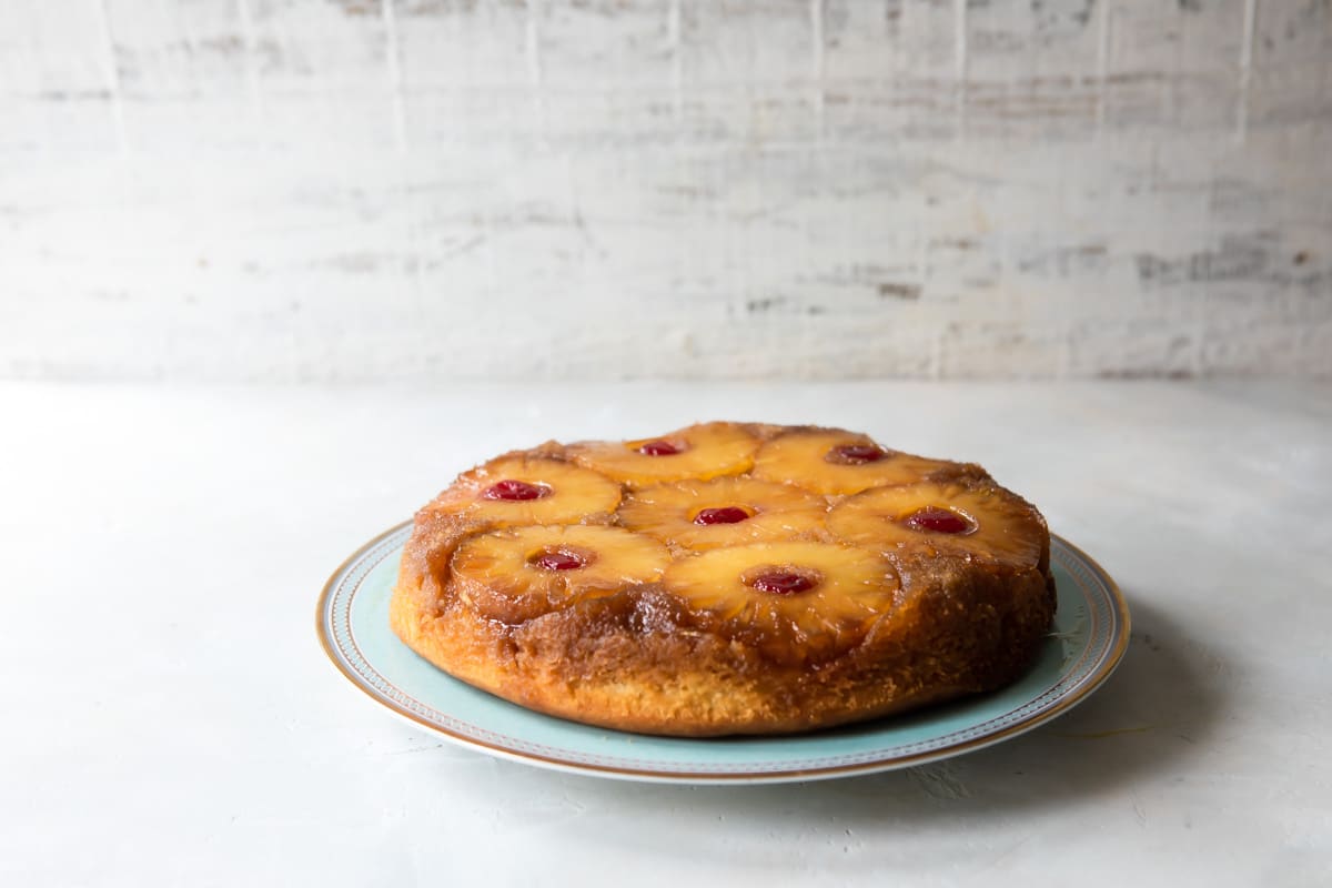 Pineapple upside down cake on a platter.