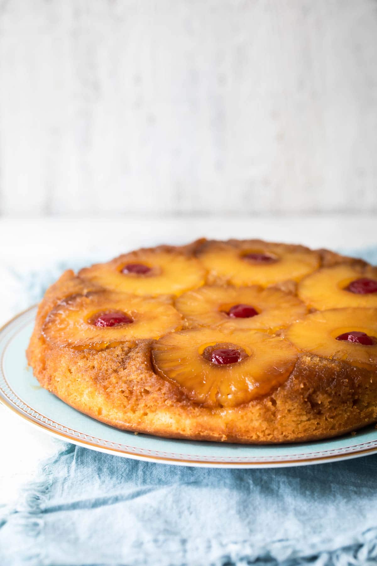 Pineapple upside down cake on a platter.