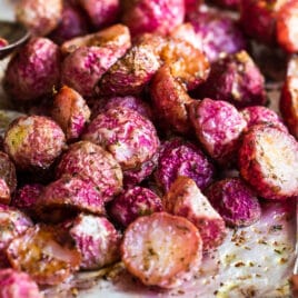 Roasted radishes on a baking sheet.