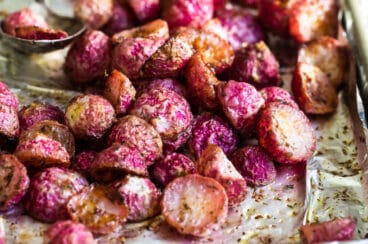 Roasted radishes on a baking sheet.