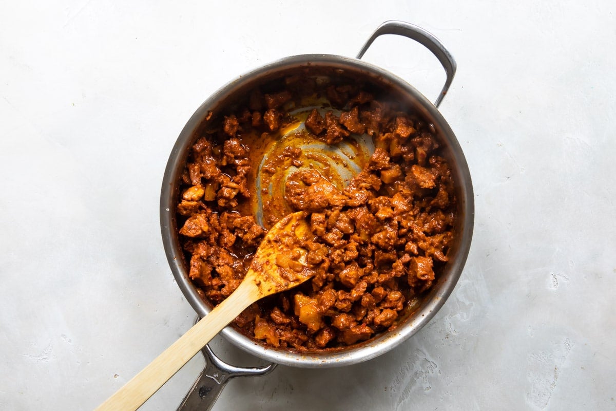 Al Pastor meat in a saucepan.