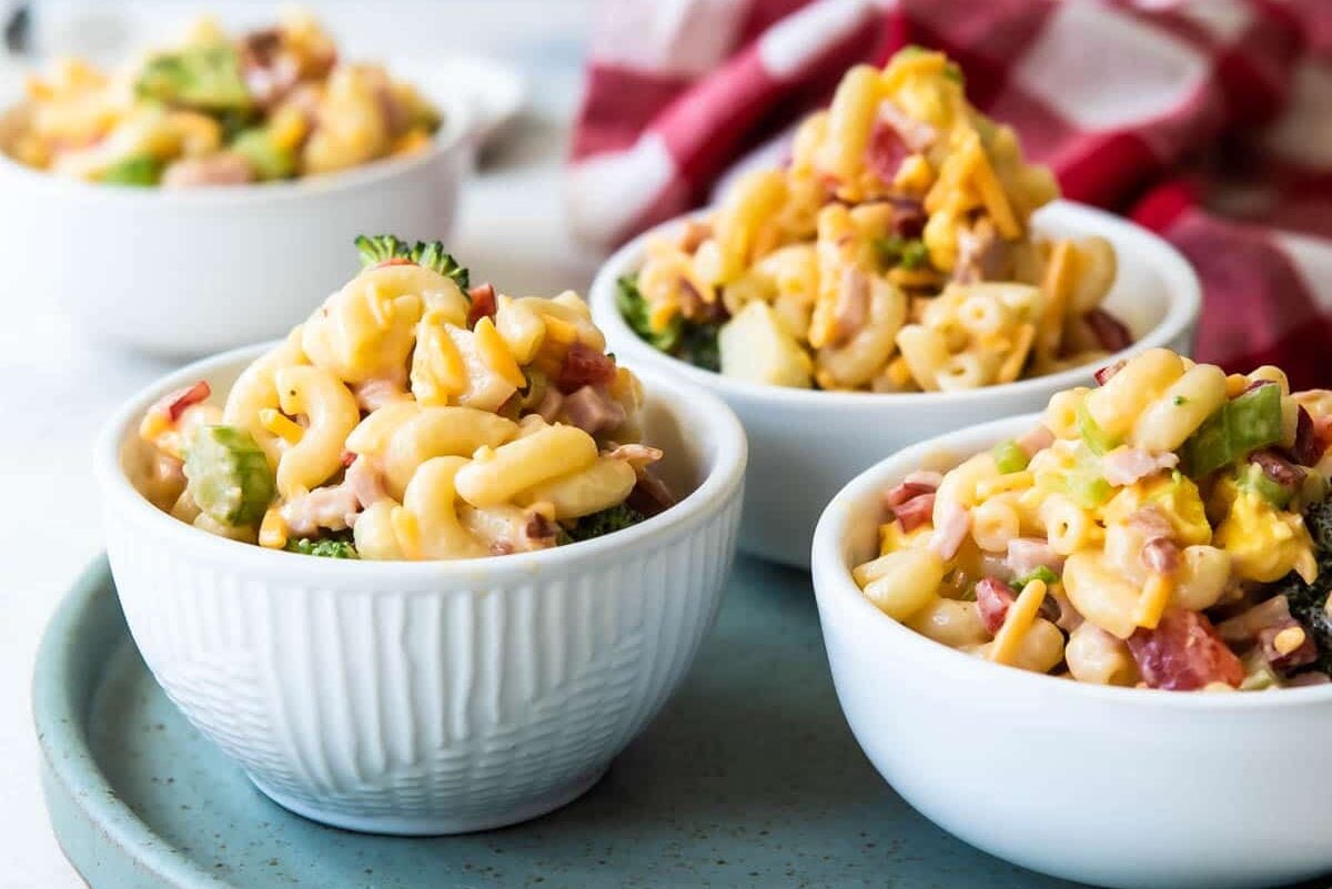 Four bowls of macaroni salad.