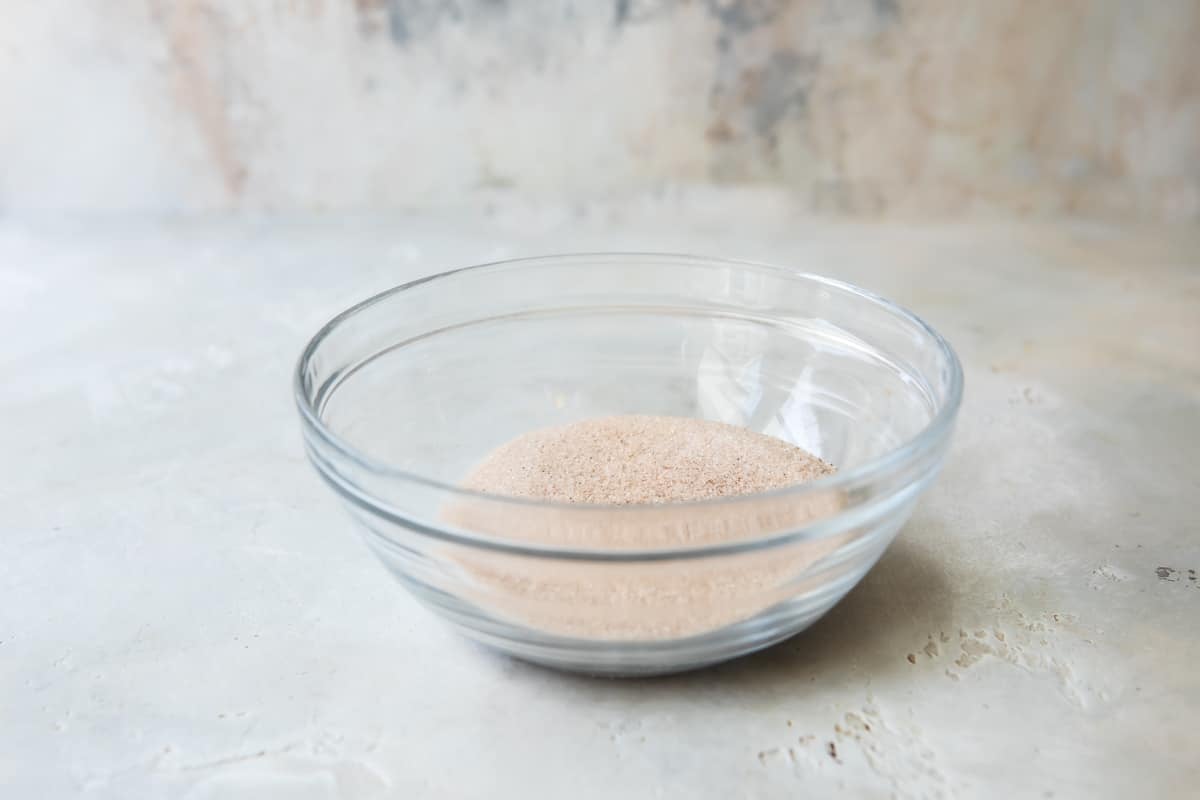 Cinnamon sugar mixture in a clear bowl.