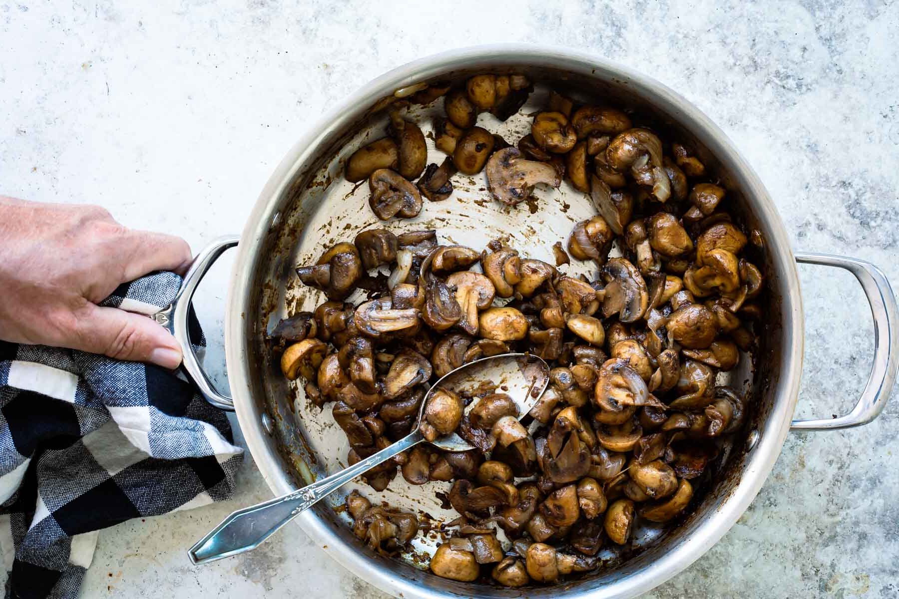 A skillet of balsamic mushrooms and onions.