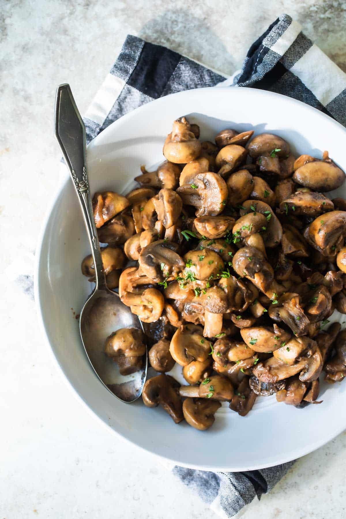 A bowl of balsamic mushrooms and onions.