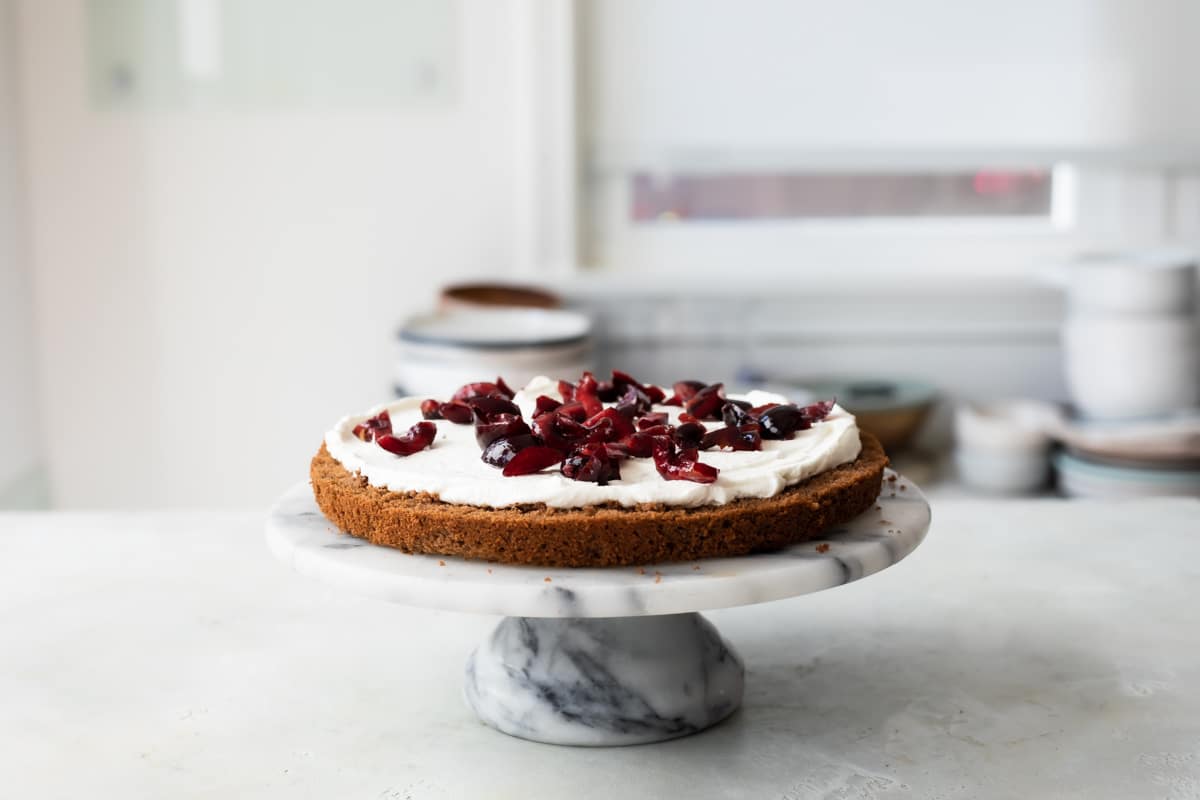 Building a Black Forest Cake on a platter.