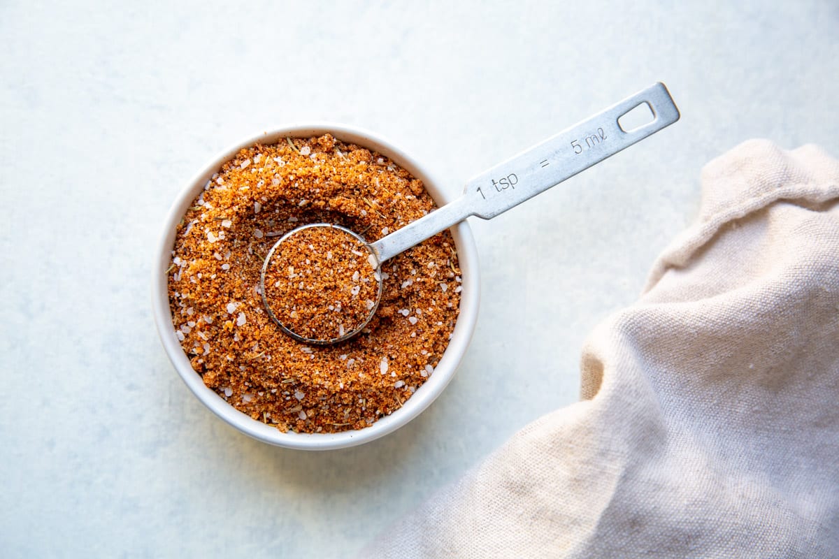 A white bowl full of dry rub seasoning.