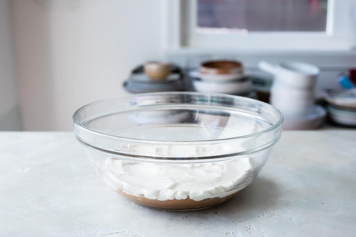 Making seven layer dip.