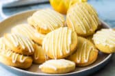 Lemon cookies on a gray plate.