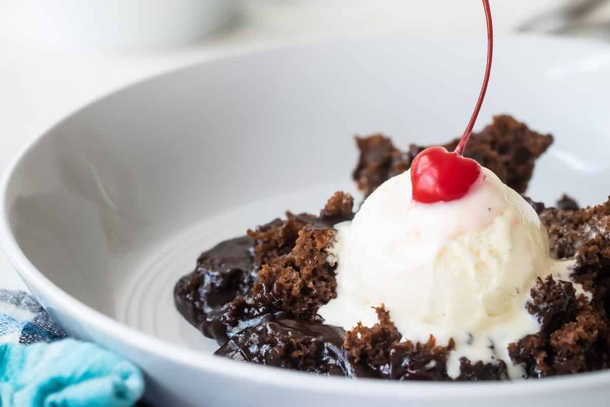 Chocolate lava cake with ice cream on top.