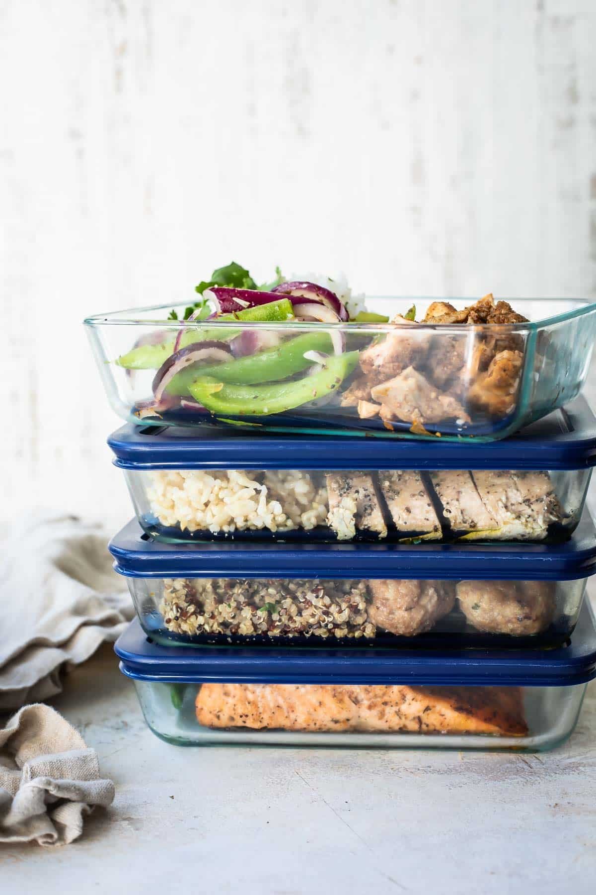 4 Weeks of Meal Prep Ideas in glass food containers.