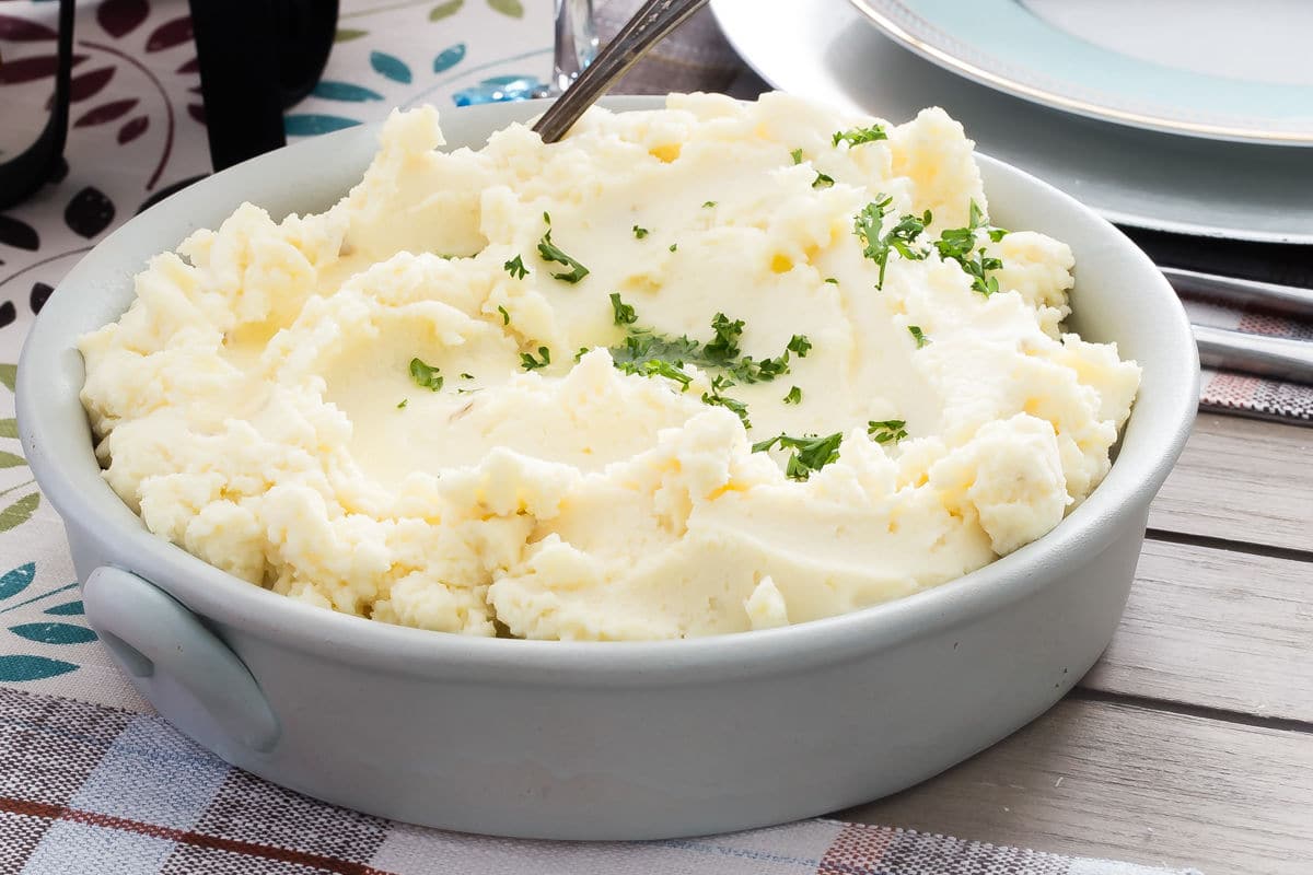A bowl of mashed potatoes.