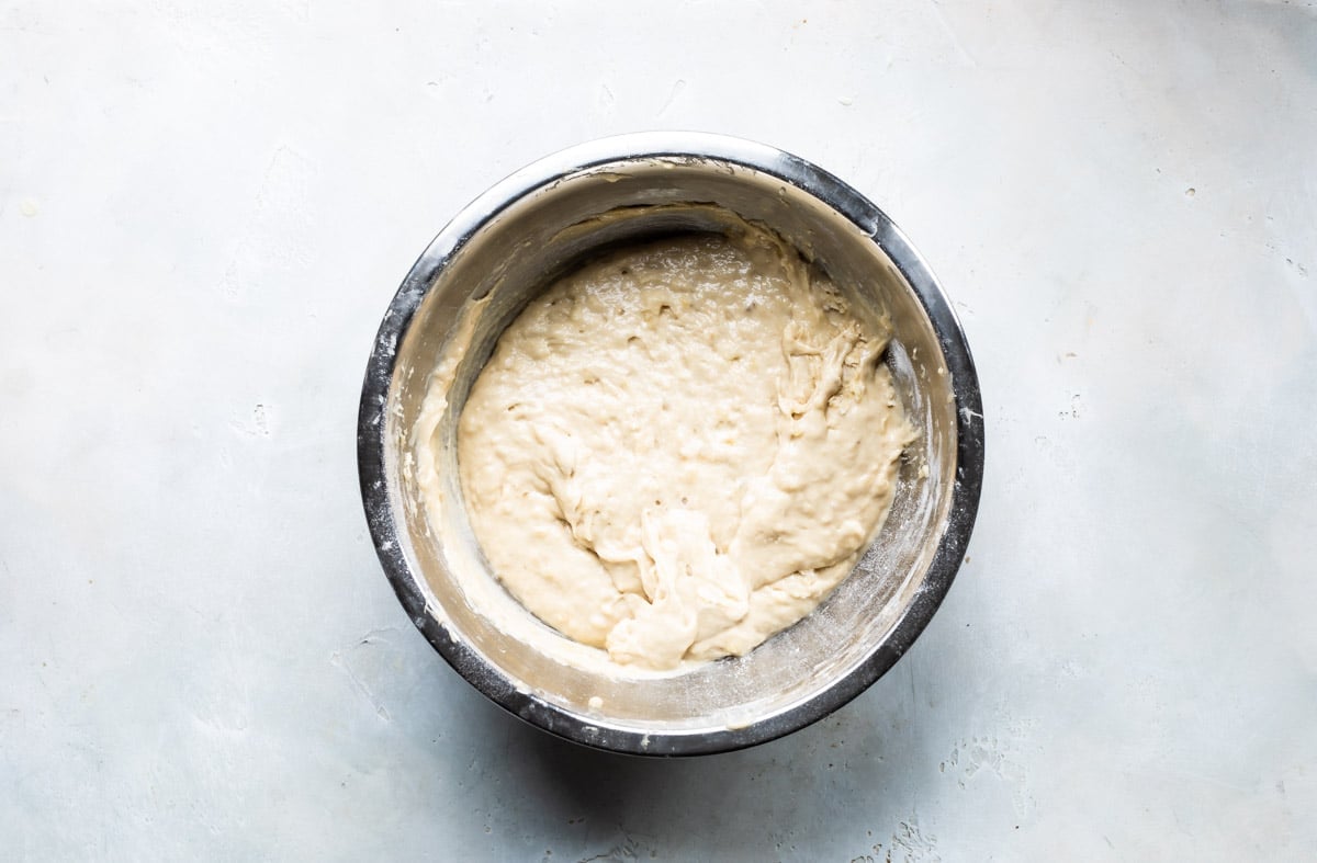 A bowl of banana bread batter.