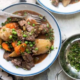 Bowls of beef stew on a table.