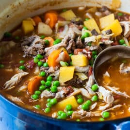 Booyah stew in a blue Dutch oven.