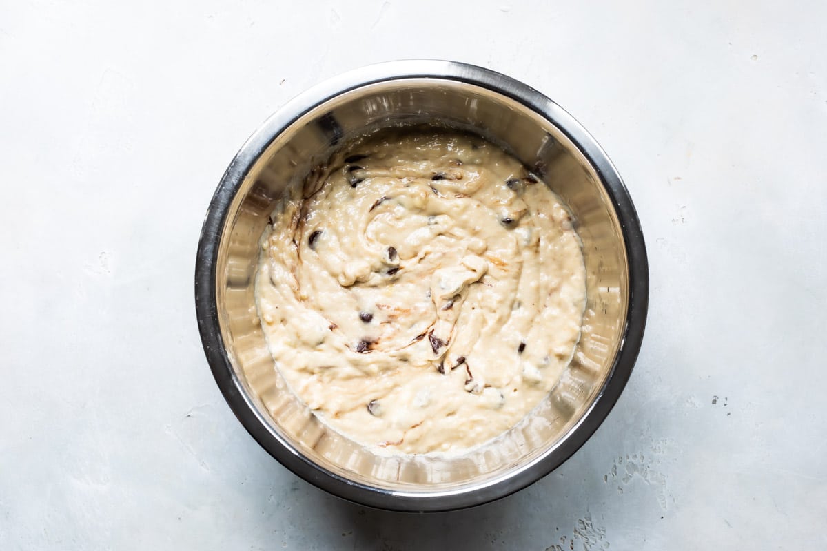 A bowl of banana bread batter.