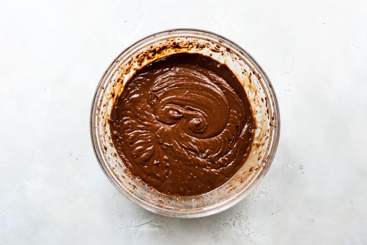 A bowl of chocolate cupcake batter.
