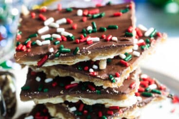 A stack of Christmas crack on a plate.