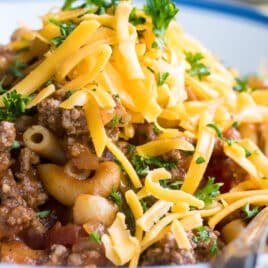 Easy goulash on white plates.