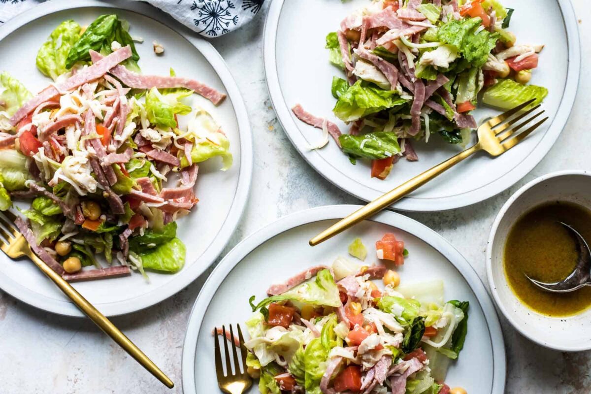 Plates of Italian chopped salad, a CPK Copycat.