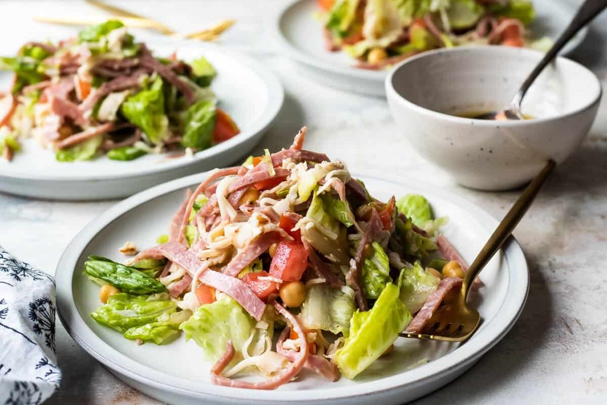 Plates of Italian chopped salad, a CPK Copycat.
