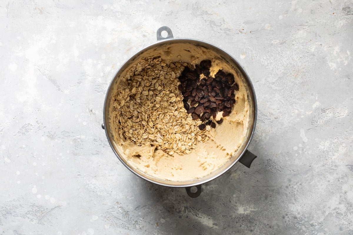 Oatmeal raisin cookie dough in a mixing bowl.