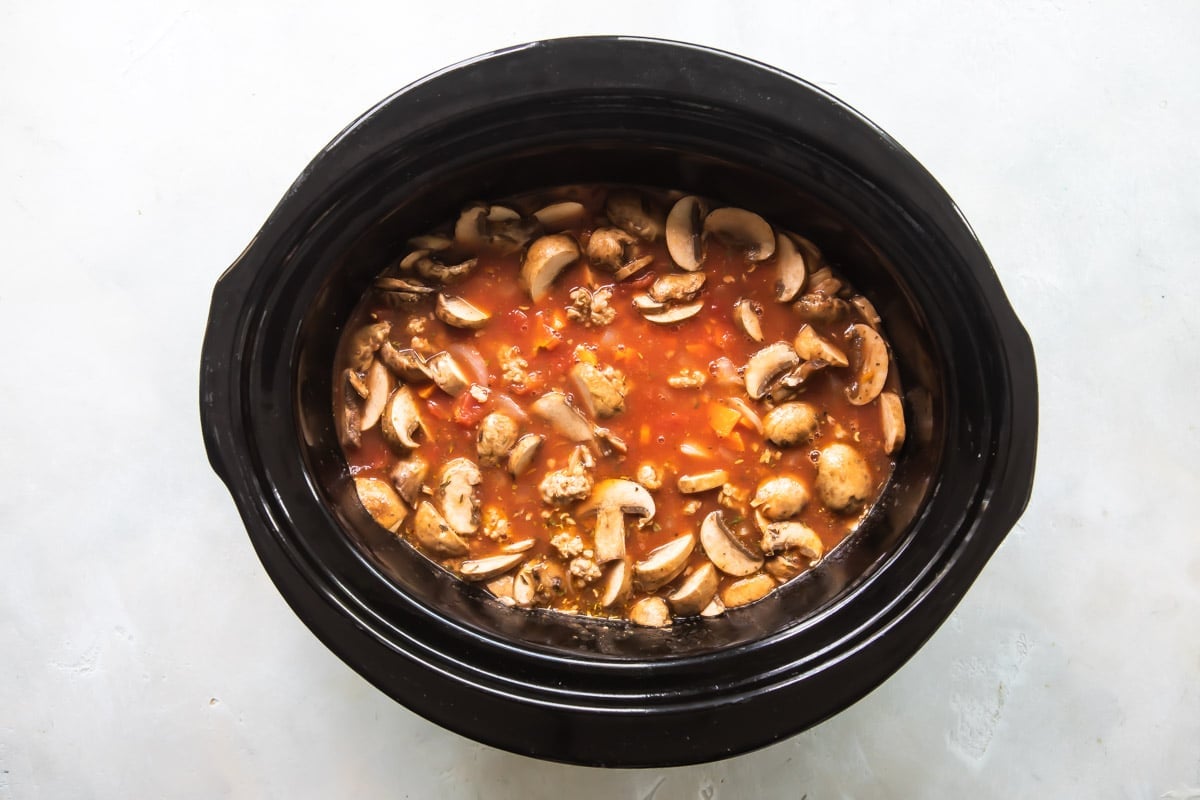 A crockpot full of lasagna soup.