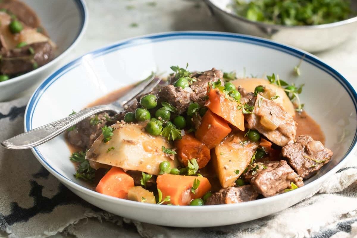 Bowls of venison stew on a table.