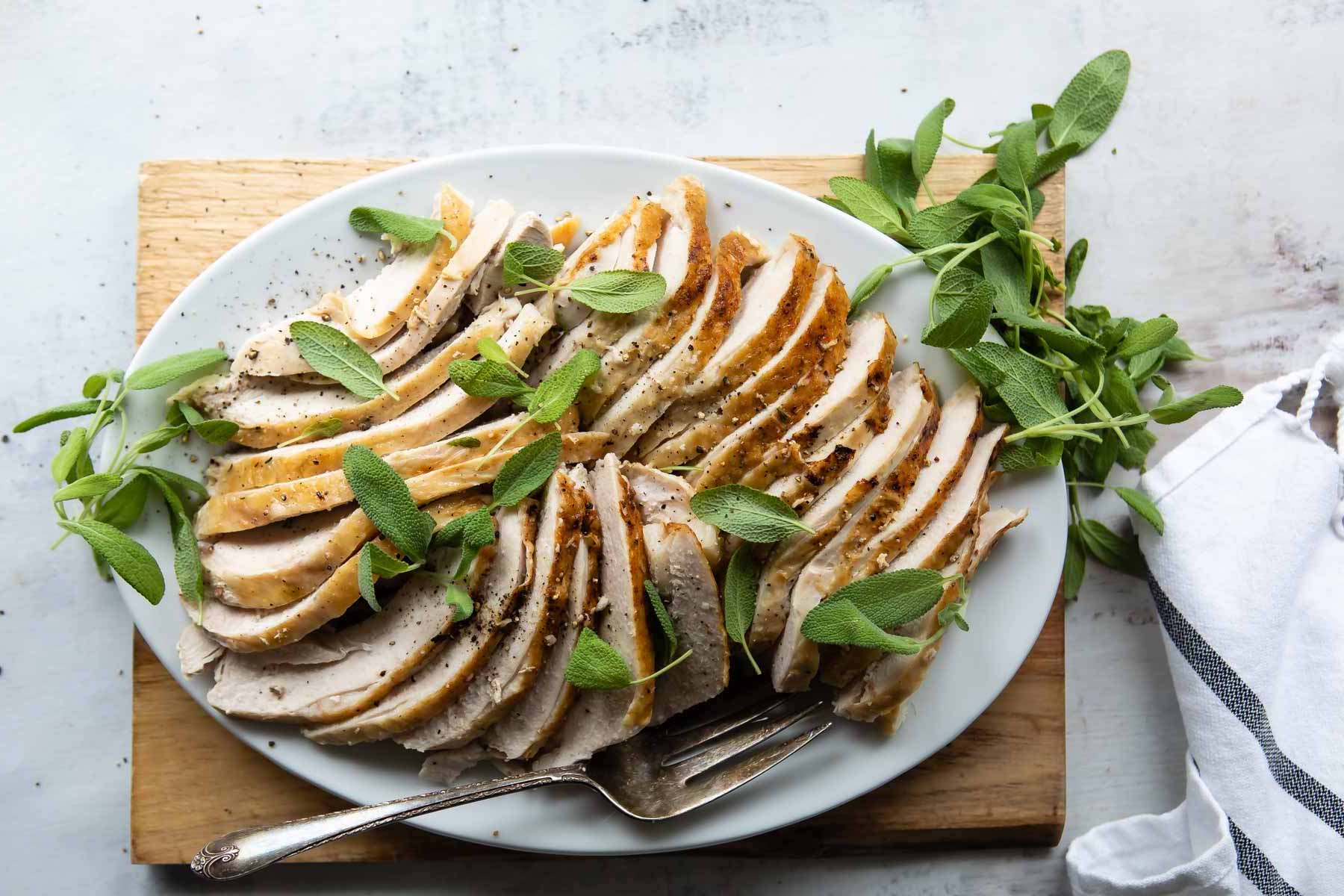 A platter of slow cooker turkey breast.