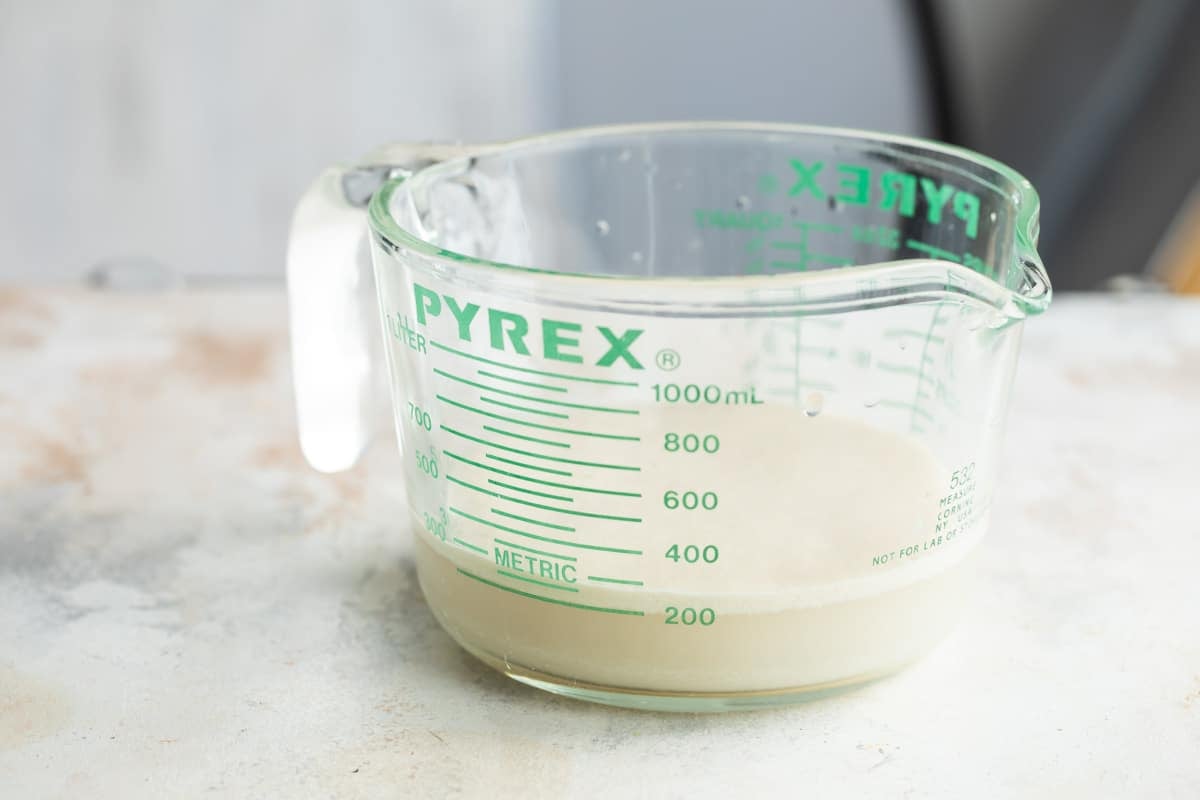 Blooming yeast in warm water.