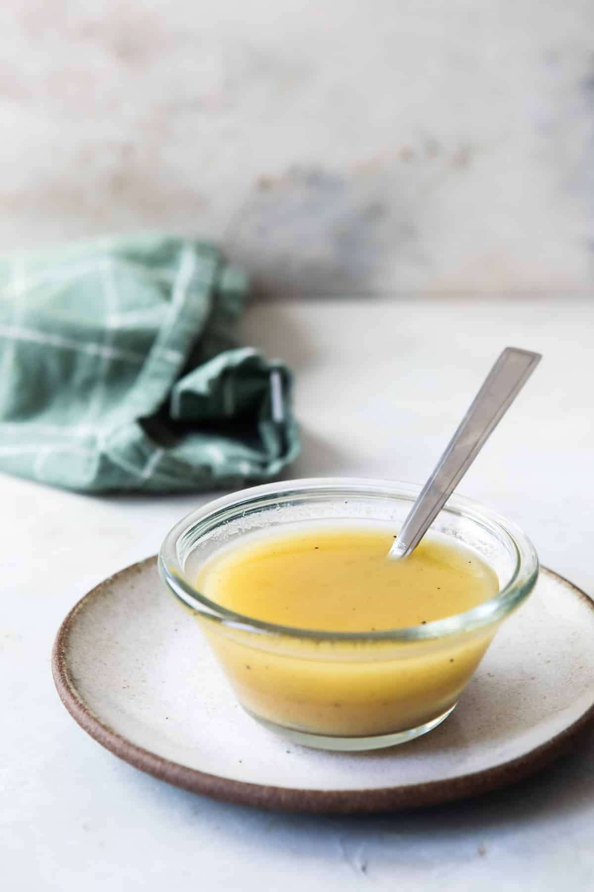 A bowl of apple cider vinaigrette.