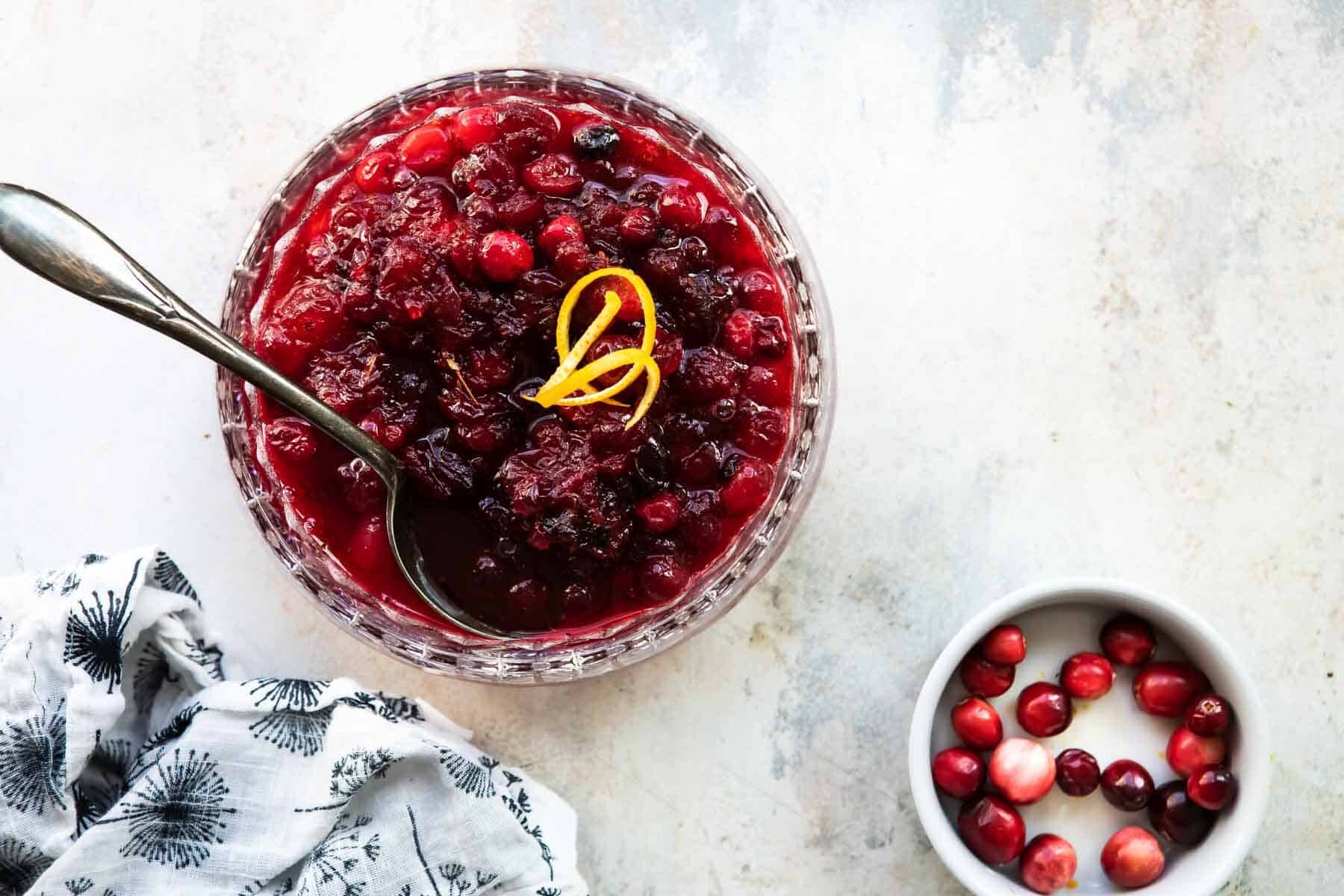 A bowl of cranberry sauce.