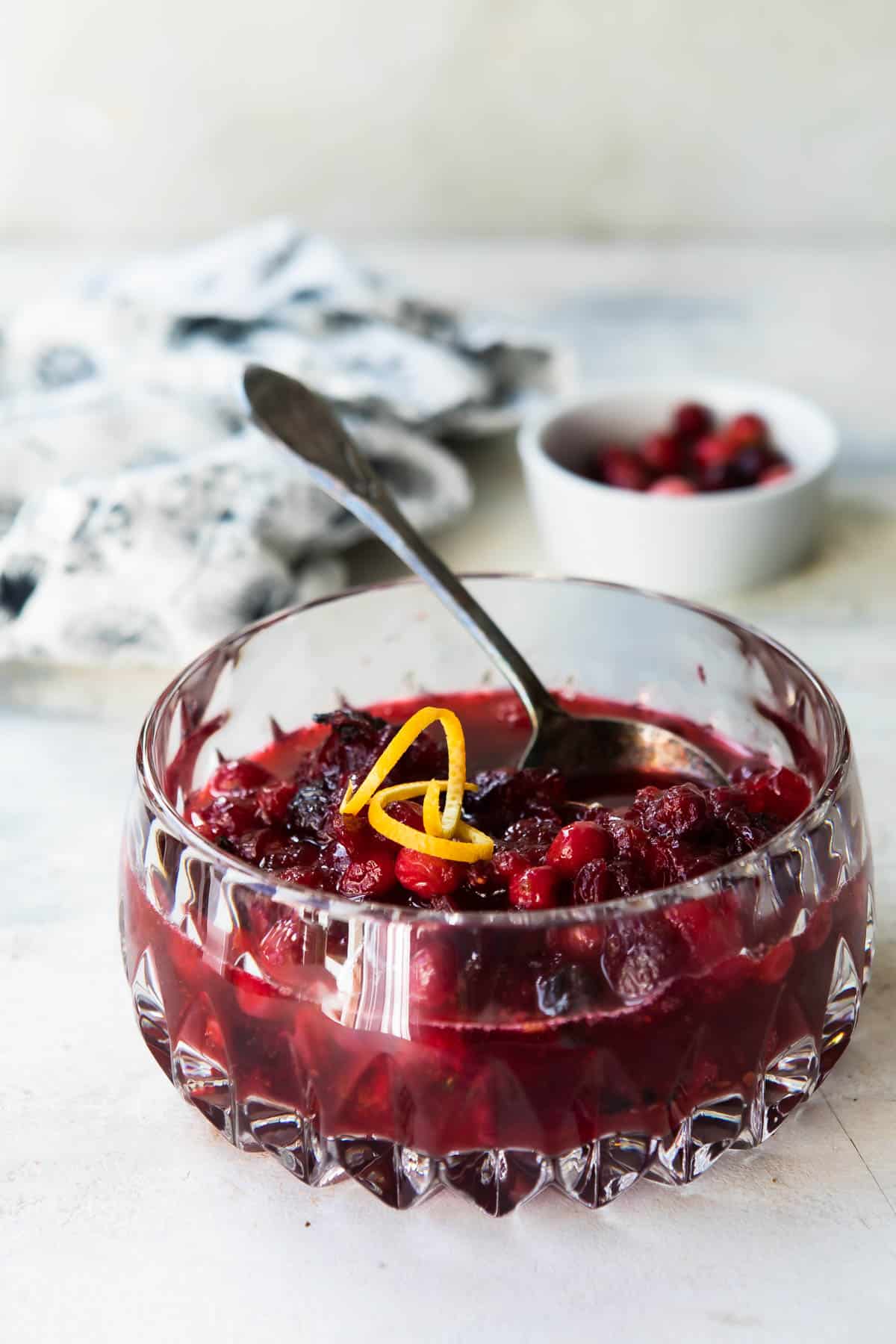 A bowl of cranberry sauce.