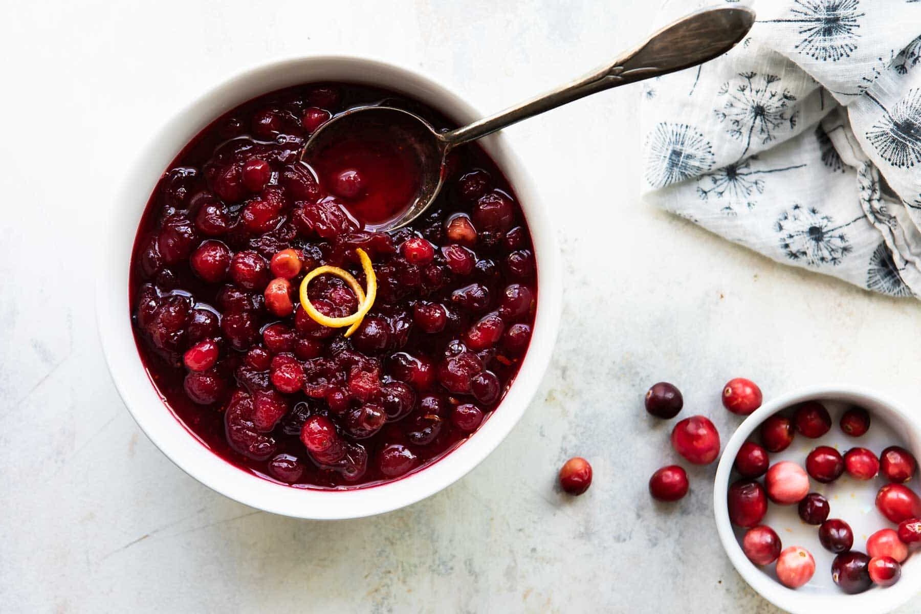 A bowl of cranberry sauce.