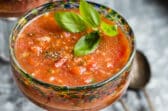 Gazpacho in a stemmed glass.