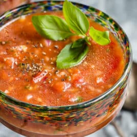 Gazpacho in a stemmed glass.