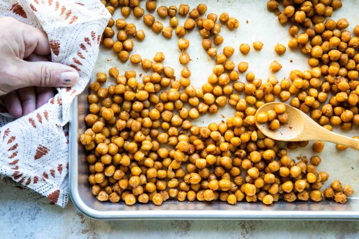 A baking sheet full of chickpeas.