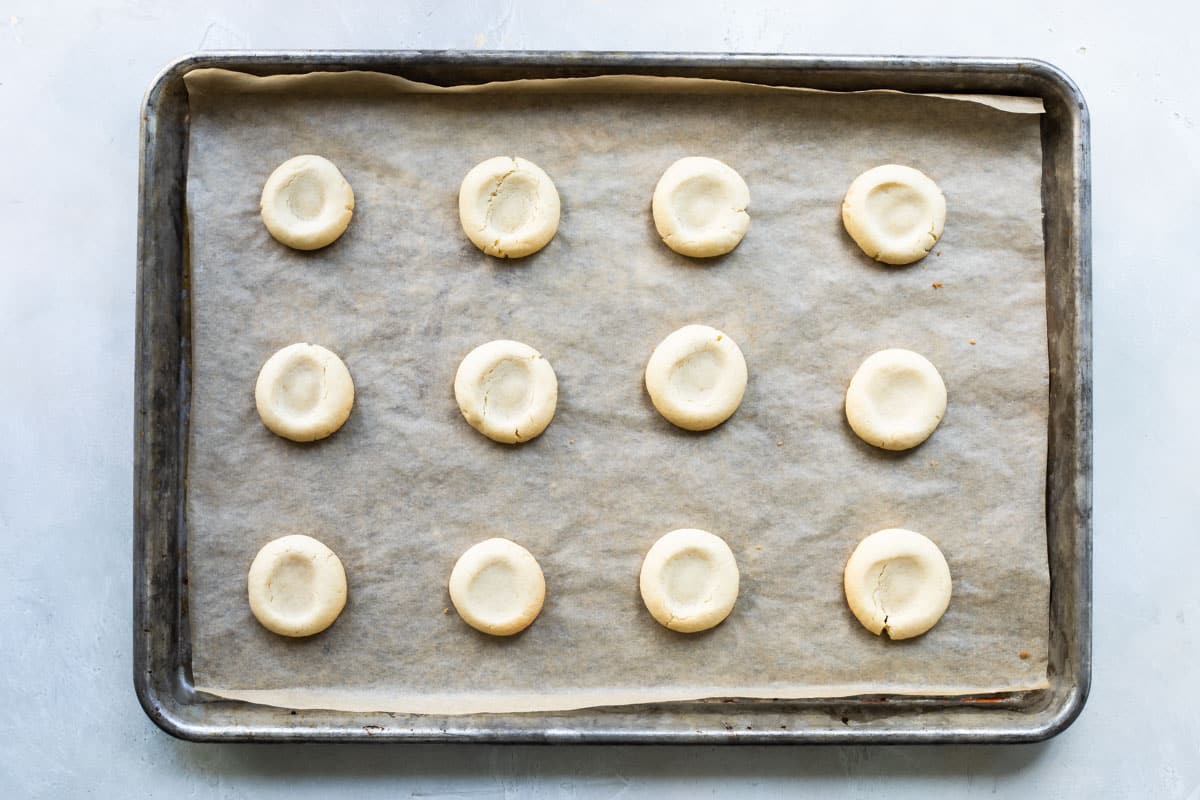 Baked thumbprint cookies without the jelly added yet.