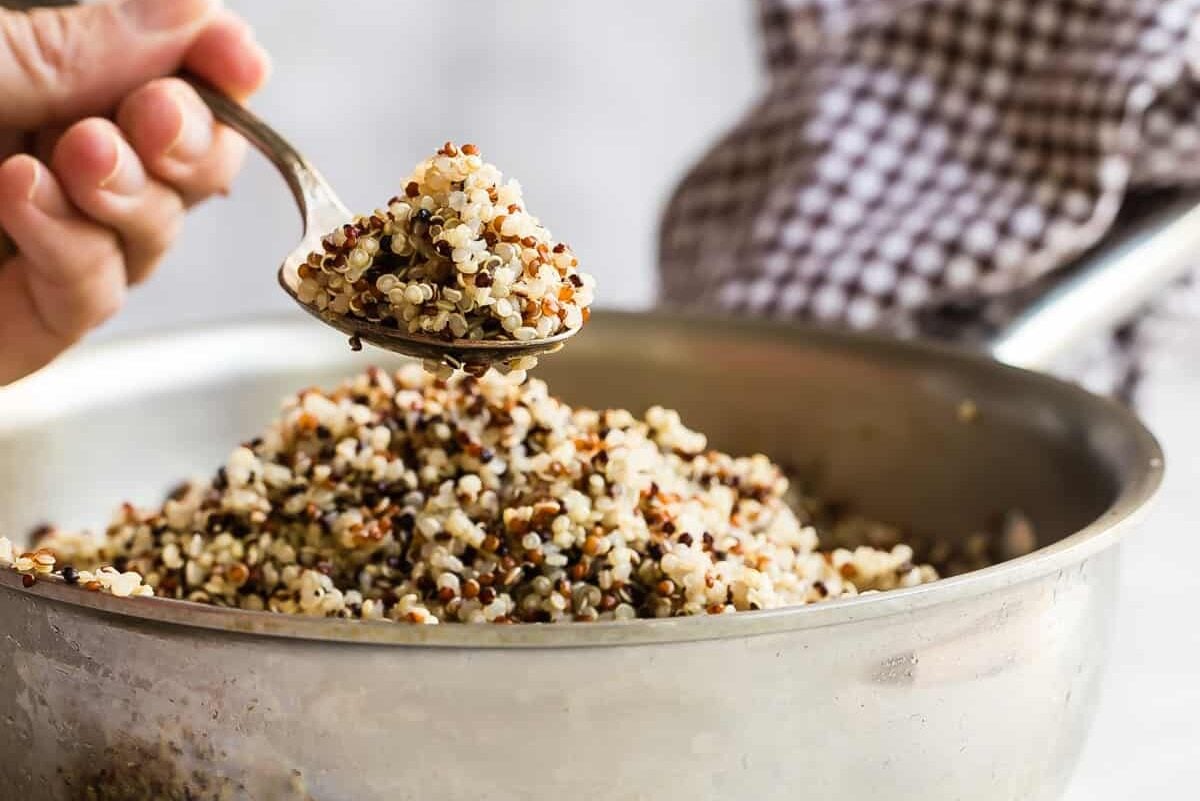 A bowl of cooked quinoa.