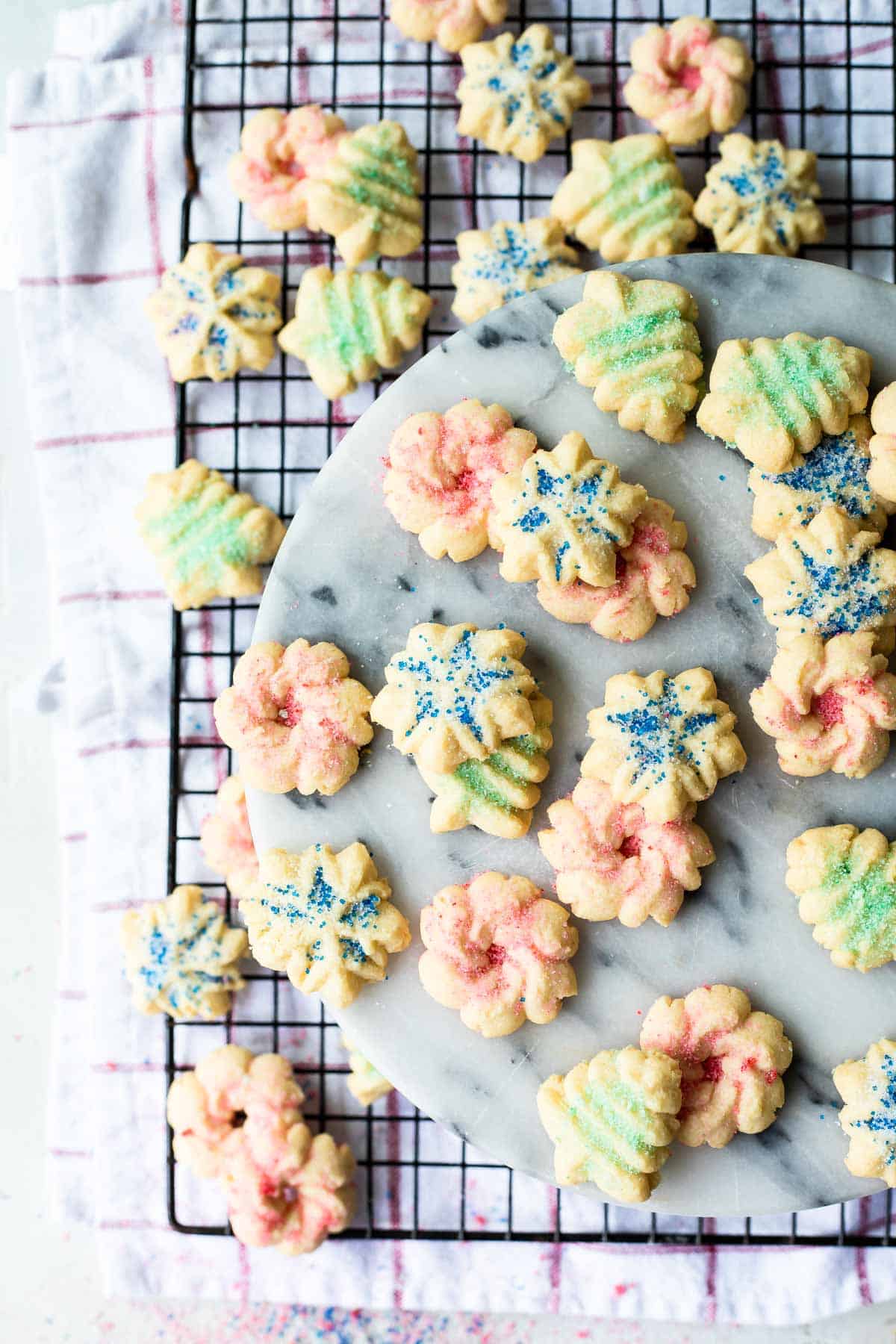 Spritz cookies on a cooling rack.