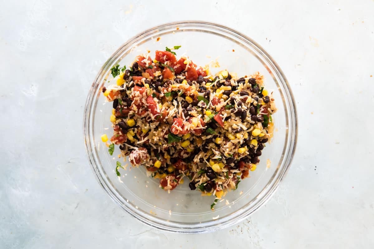 Vegetarian stuffed pepper filling in a clear bowl.
