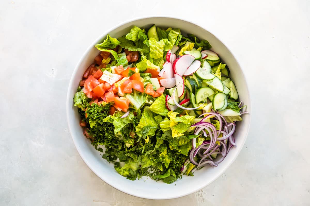 A bowl of vegetables for fattoush salad.