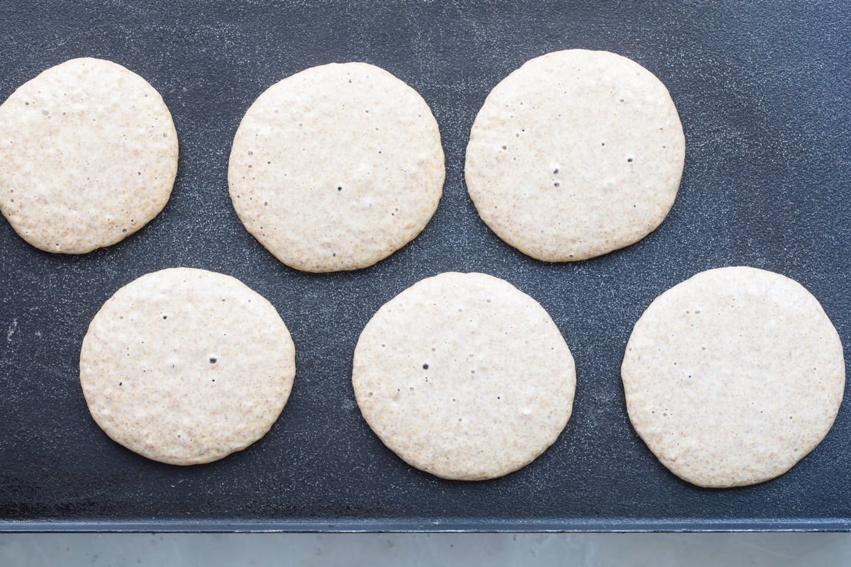 Healthy pancake batter on a skillet.