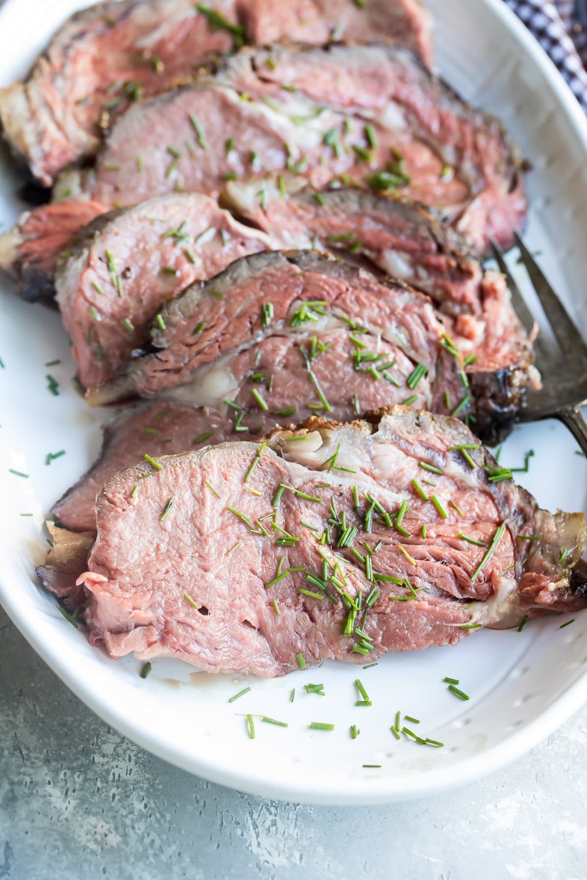 A platter of sliced prime rib.