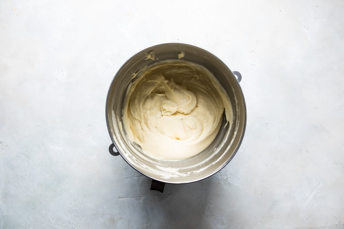 Vanilla cake batter in a mixing bowl.