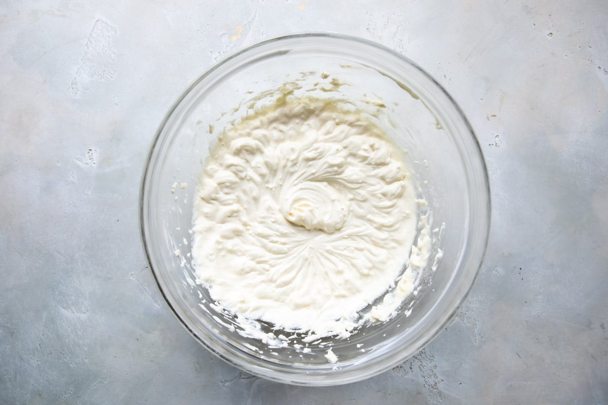 Cream cheese and sour cream mixed together for grape salad.