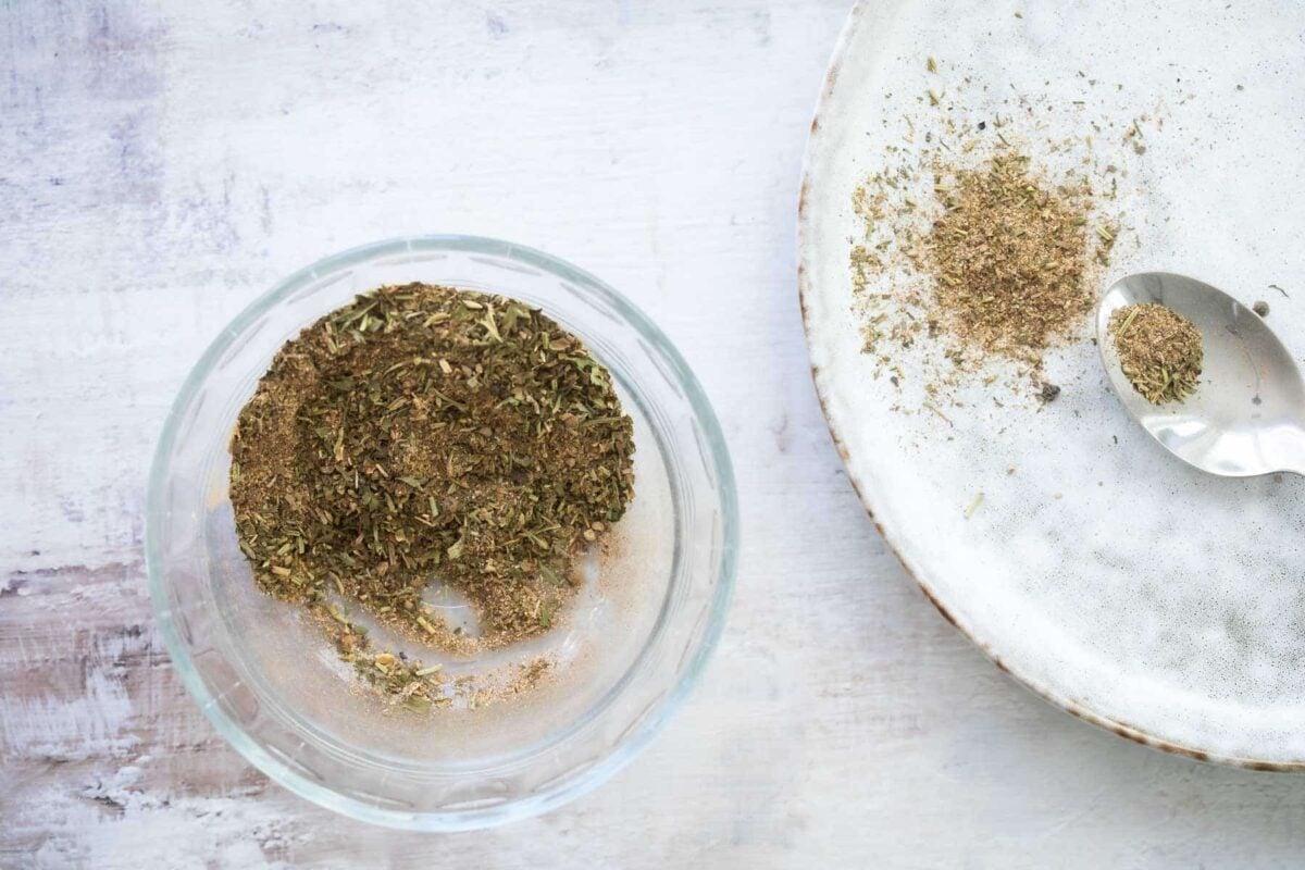 A jar of homemade Greek Seasoning.