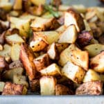 Oven roasted potatoes on a baking sheet.