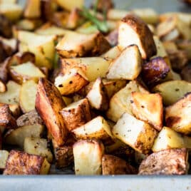 Oven roasted potatoes on a baking sheet.